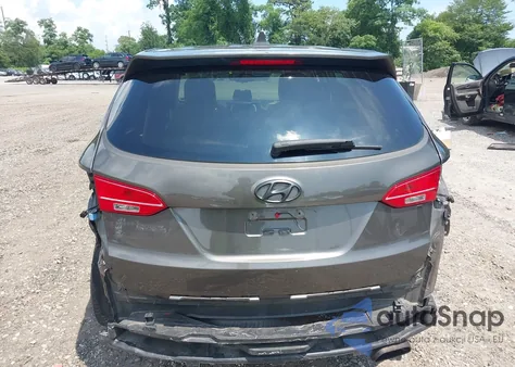 2014 Hyundai Santa Fe Sport 2.4L z USA, uszkodzony, nr VIN 5XYZT3LB8EG211915